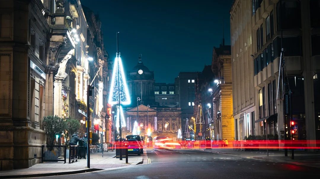 Castle Street in Liverpool at night with glowing Christmas lights and the Town Hall in the background