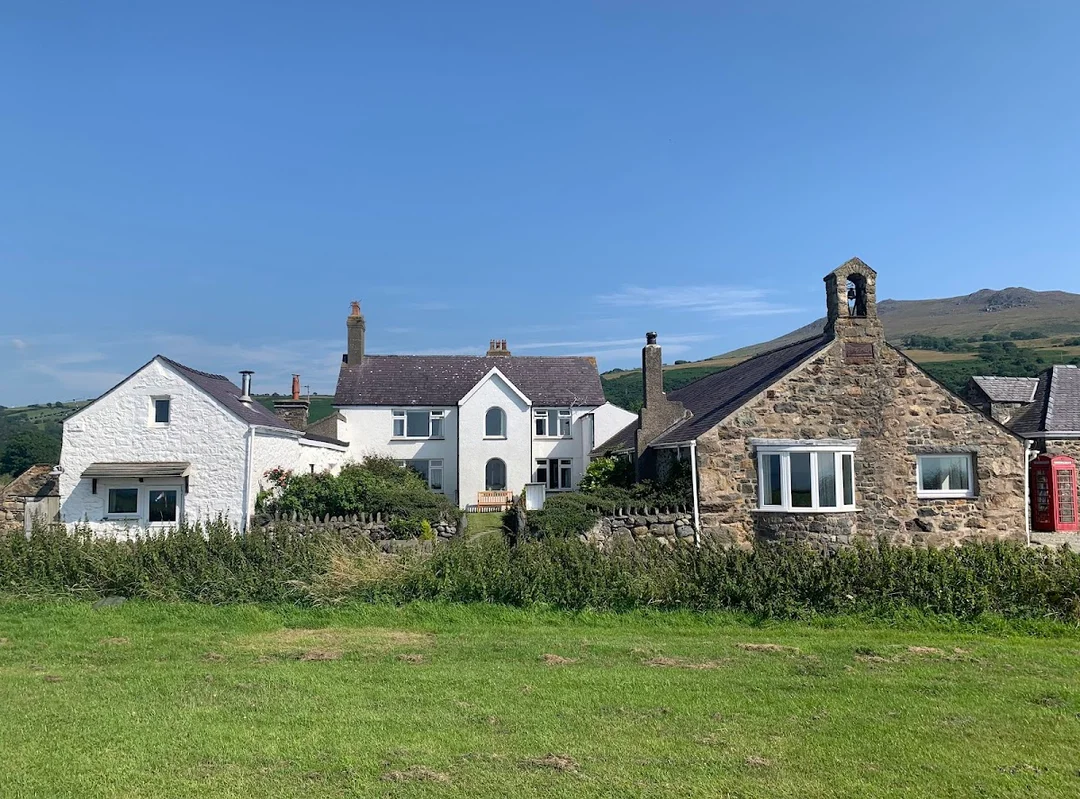 Trade city life for coastal charm at these rustic stone cottages on the Llyn Peninsula.