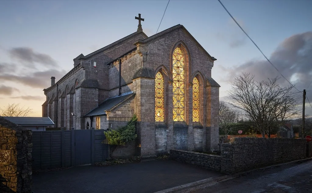 The stunning converted Gothic church retreat, showing its unique architecture and spacious interior for a hen