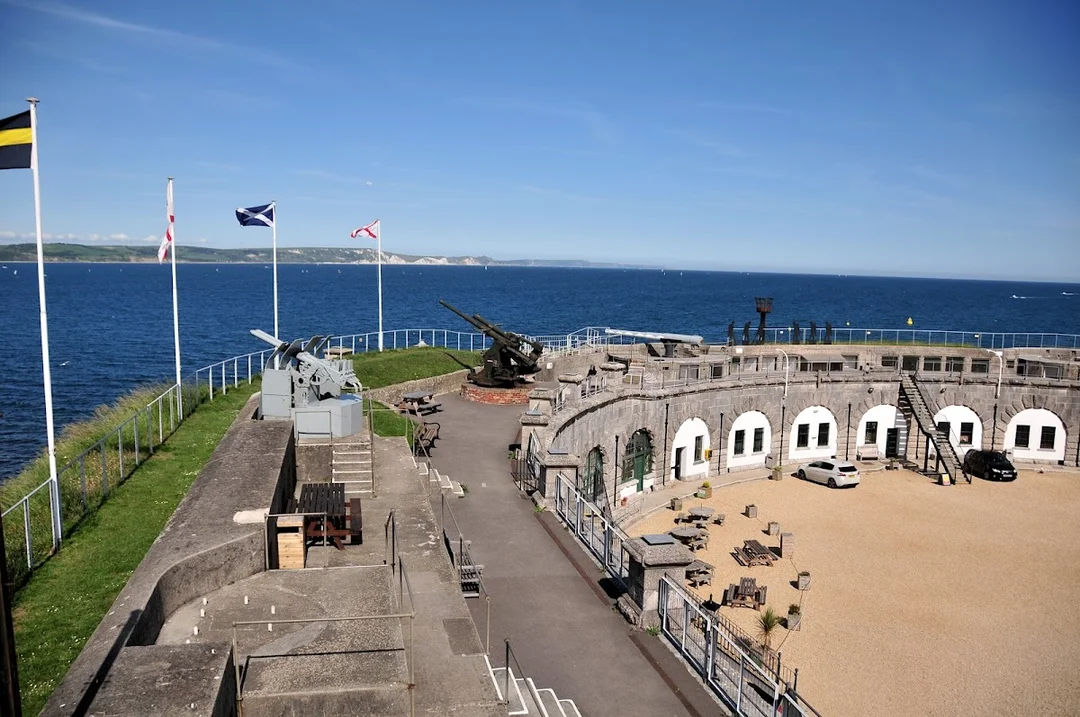 The historic Nothe Fort overlooking the sea in Weymouth, a scenic spot for a walk.