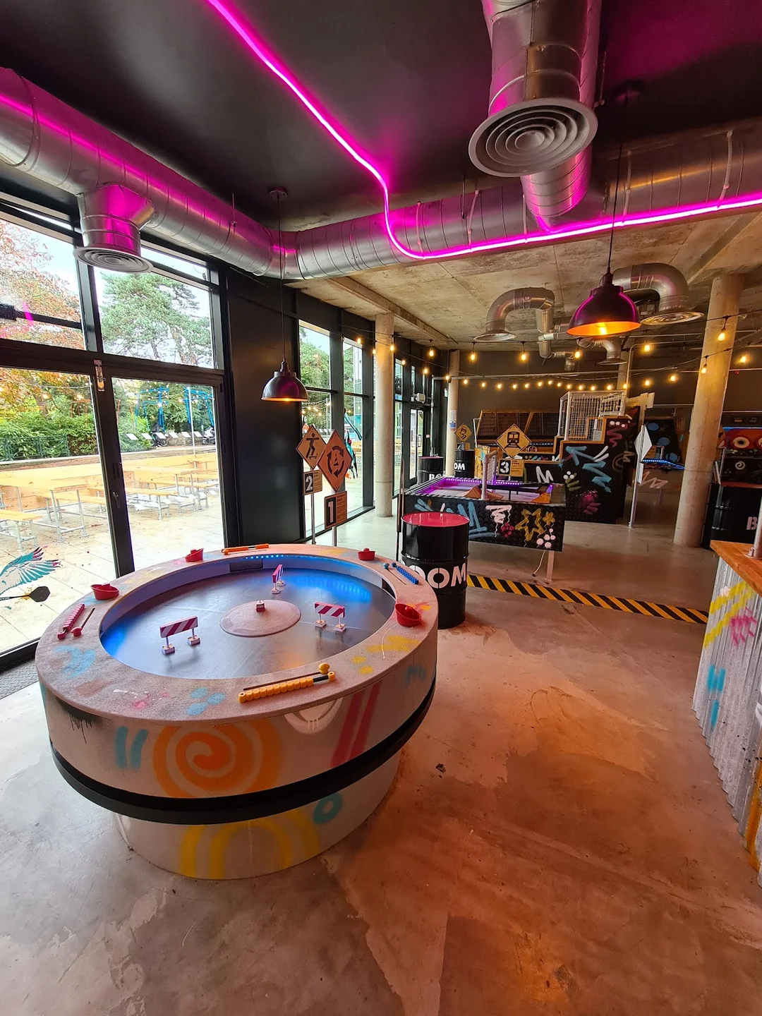 A hen party group playing augmented reality darts at Boom Battle Bar.