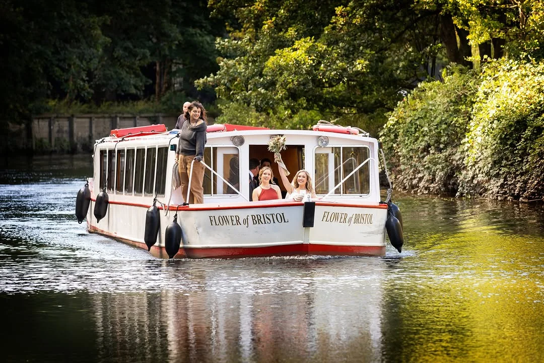 A group enjoying a private boat trip on a Bristol Packet vessel along Bristol
