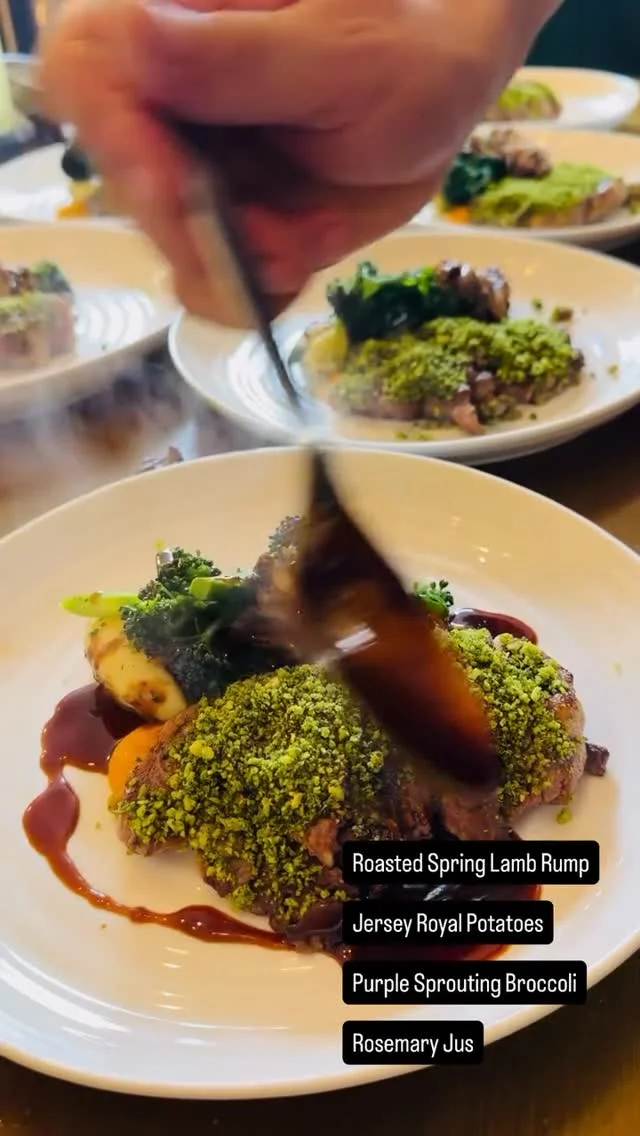 A private chef from Babylon Dining plating a beautifully presented meal in a hen party accommodation.