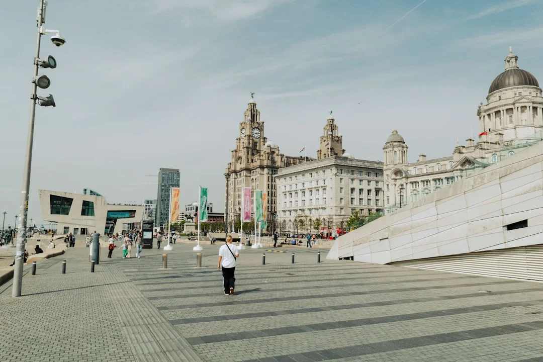 Liverpool Pier Head cityscape with the Royal Liver Building, Cunard Building, and Port of Liverpool Building