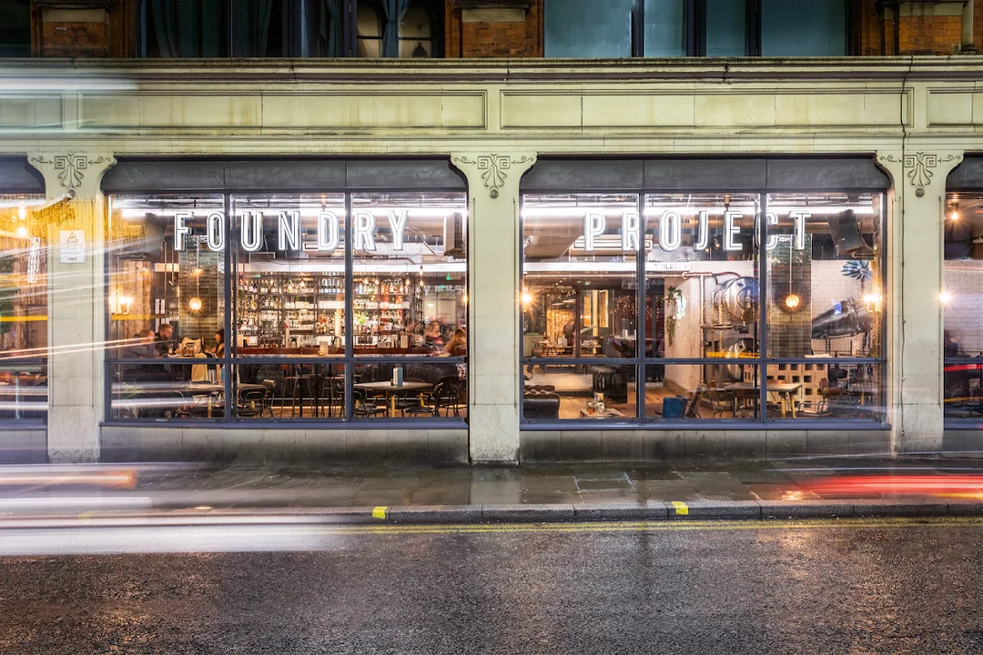 The stylish interior of Foundry Project in Manchester, with groups enjoying brunch and cocktails.