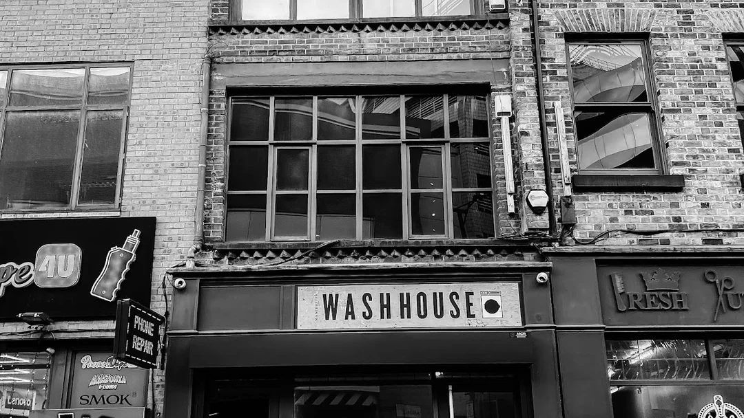 The secret entrance to Washhouse bar in Manchester, disguised as a laundrette.