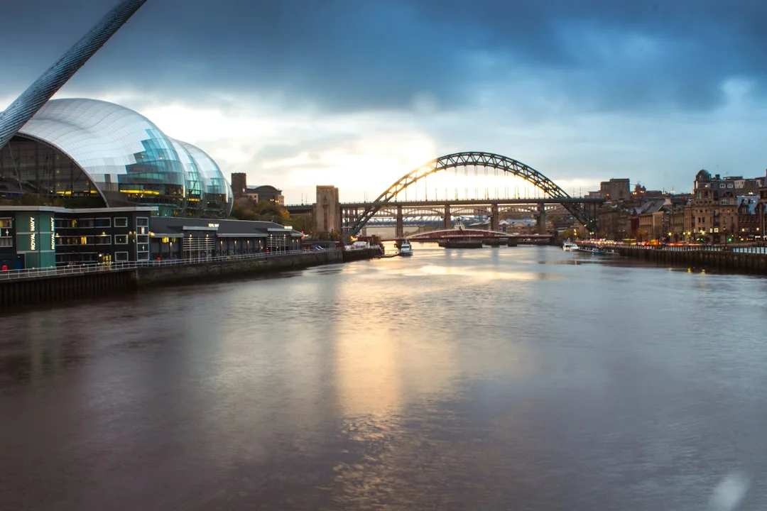 Newcastle upon Tyne skyline with the Tyne Bridge and Sage Gateshead at dusk