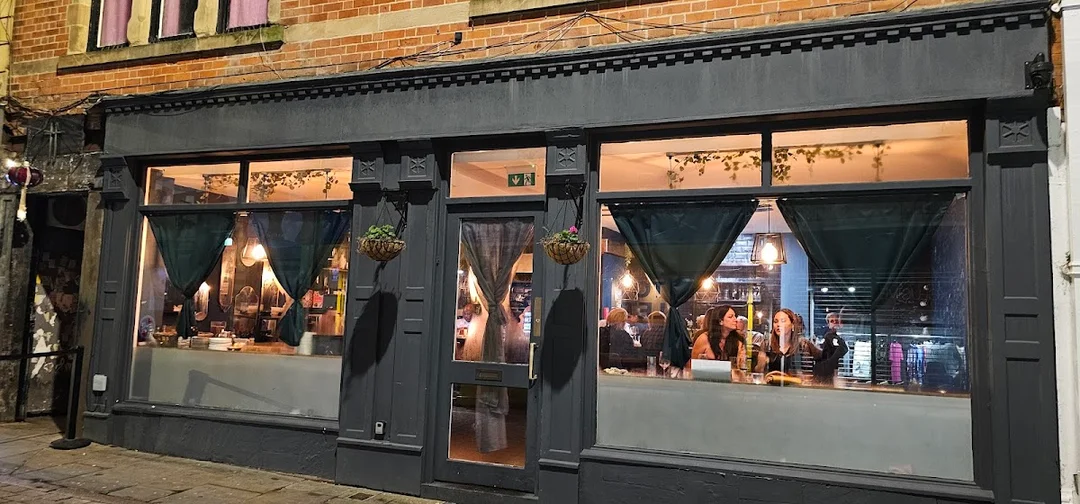 An elegant private dining room at Table 47 with a long chef