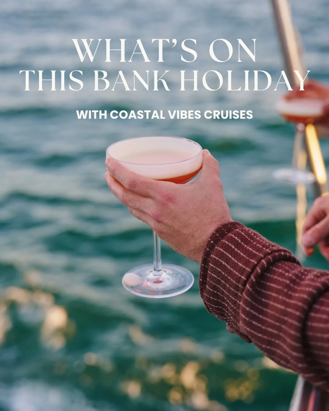 A party boat from Coastal Vibes Cruises sailing along the Jurassic Coast at sunset.