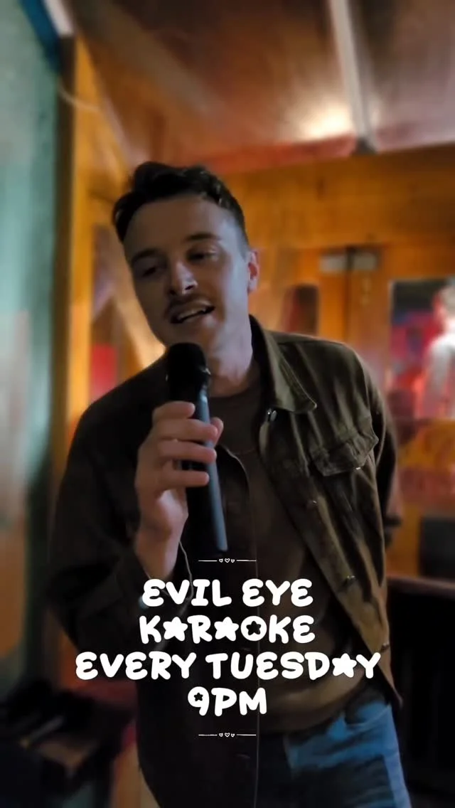 The quirky, atmospheric interior of Evil Eye Lounge in York, showing its extensive spirit collection.